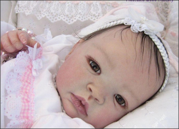 baby doll that looks real and cries